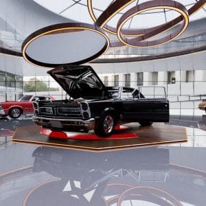 Muscle car Pontiac GTO 1967 noir classique avec capot ouvert exposé dans une salle d'exposition moderne.