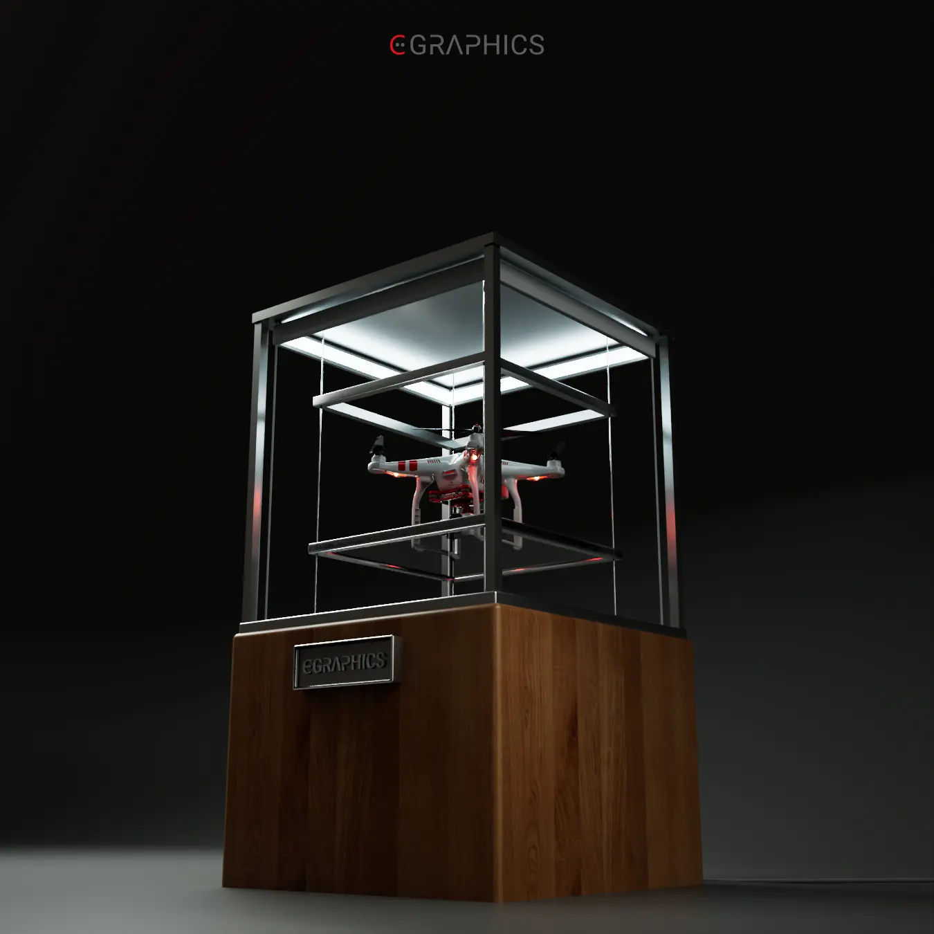 Drone exposé dans un cube en verre éclairé.